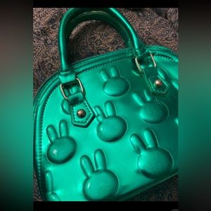 Metallic green bag